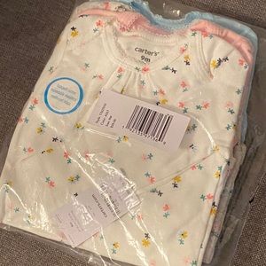 Carter’s long sleeve onesies 4pack -9 months